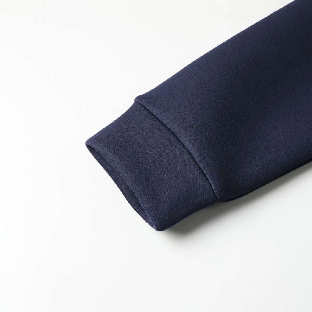 The cuffs are made of the same fabric as the body.