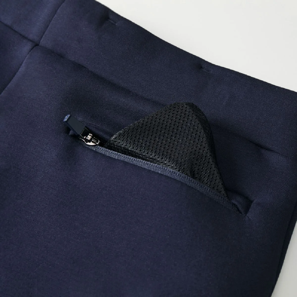 Black and navy mesh is used.