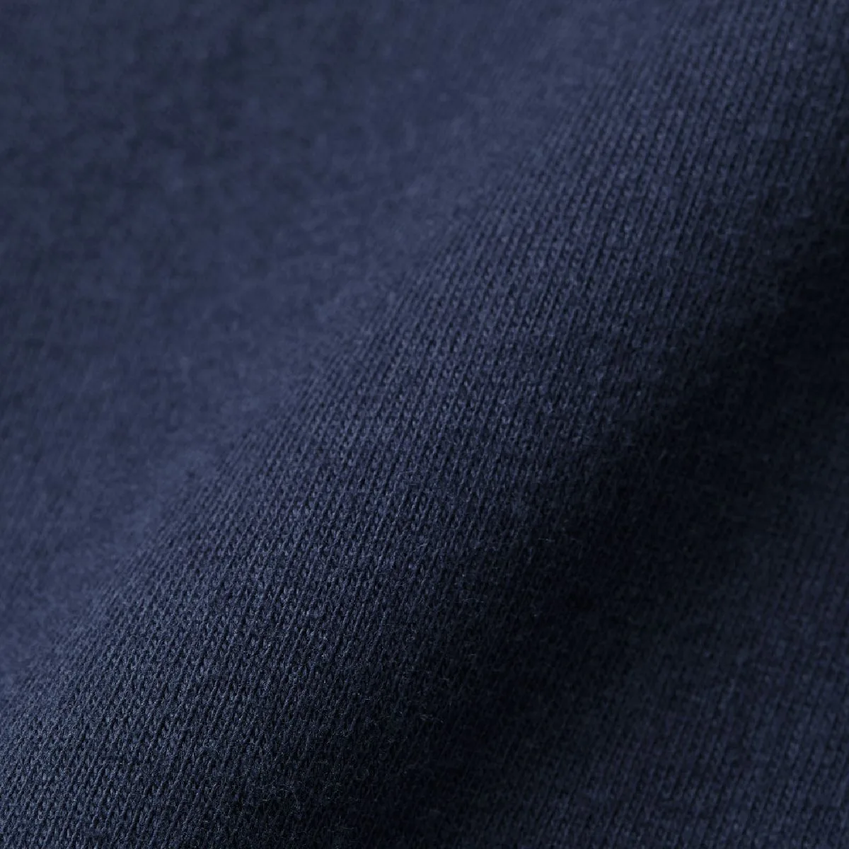 5.6 oz fabric using a devised thread to reduce fluff