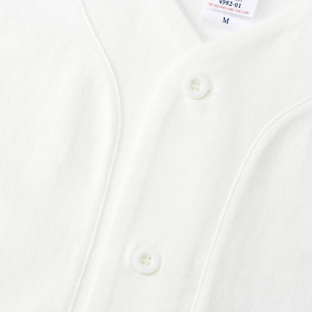4982-01 8.5oz Cotton Jersey Baseball Shirt 8 The matte textured buttons are the same color as the body