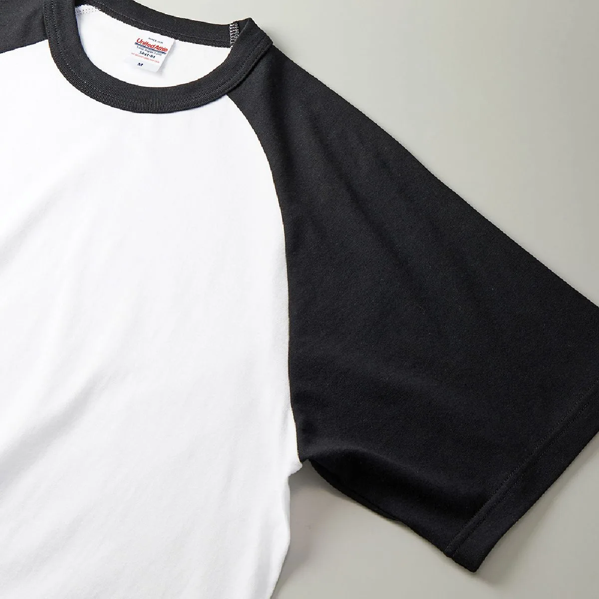 5041-01 Retro 5.6oz Raglan Sleeve T-Shirt 11 The armholes are lagran sleeve specifications, the cuffs are cleaned up 2 needles