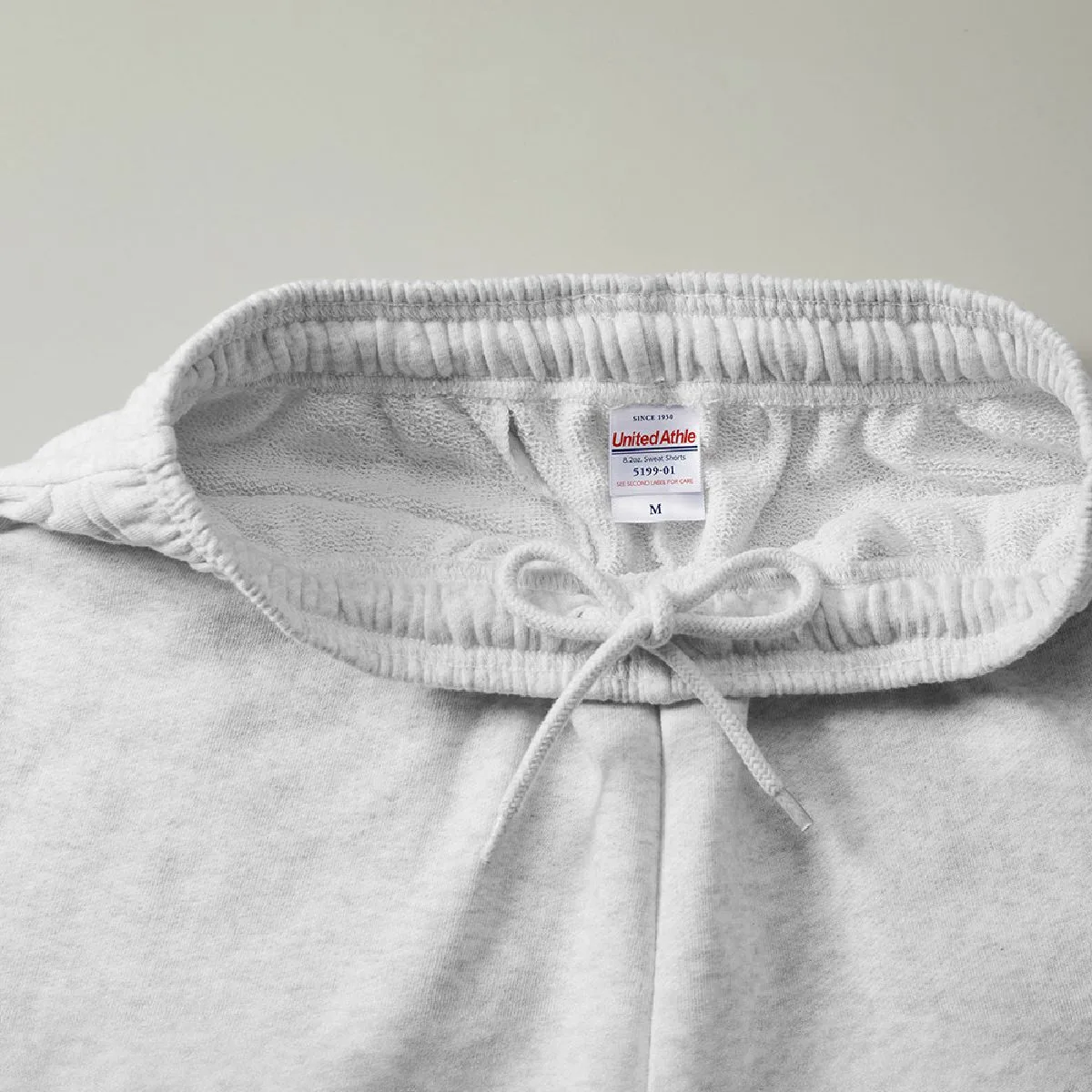 5199-01 8.2oz French Terry Sweat Shorts 8 The waist has a adjustable round strap (inside)