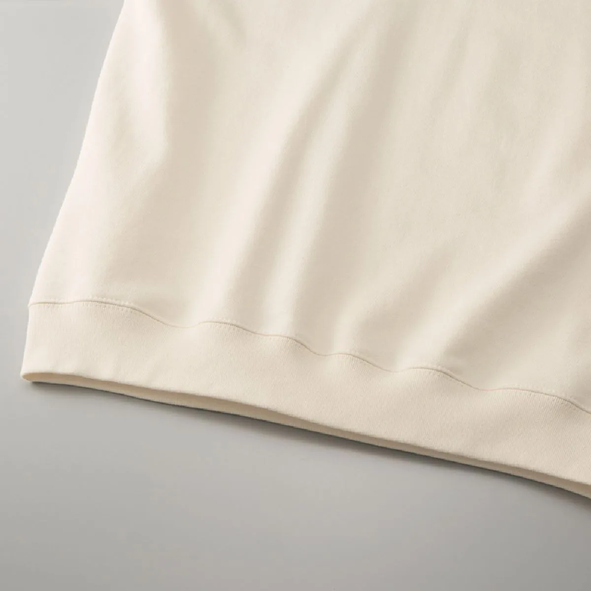 5399-01 8.8oz French Terry Crewneck Sweatshirt 18 The ribbed hem and seam lines on the body are sturdy double stitched.