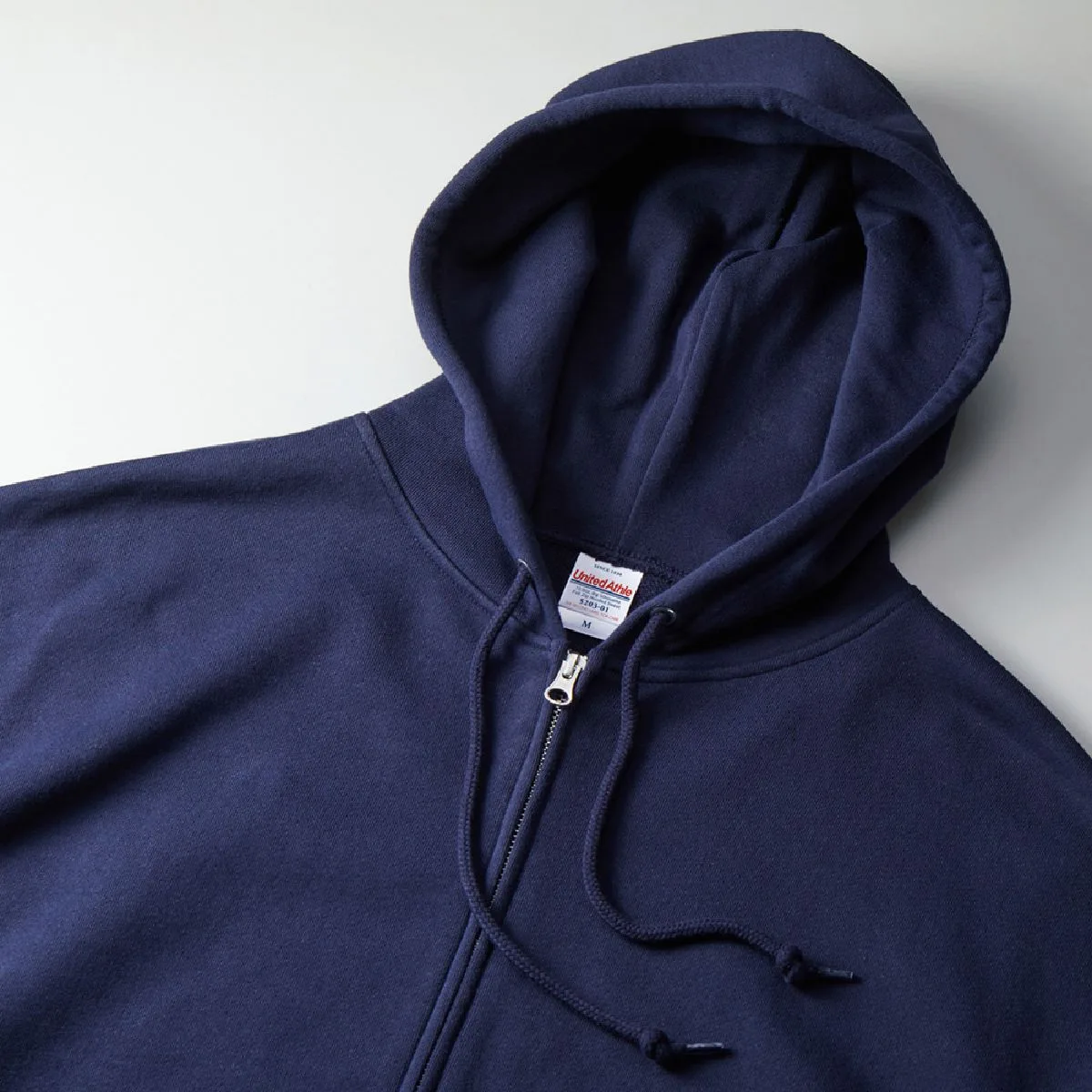 5203-01 10.0oz Oversided Fullzip Hoodie (French Terry) 6 It features a large double food with a strong presence, the Food string is the same color, and the tip is chip processed.