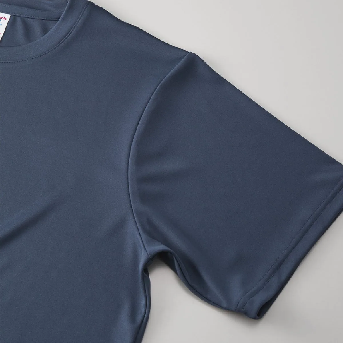 The cuffs are finished with two needles and two needles after the overlock is removed, giving it a sturdy finish.