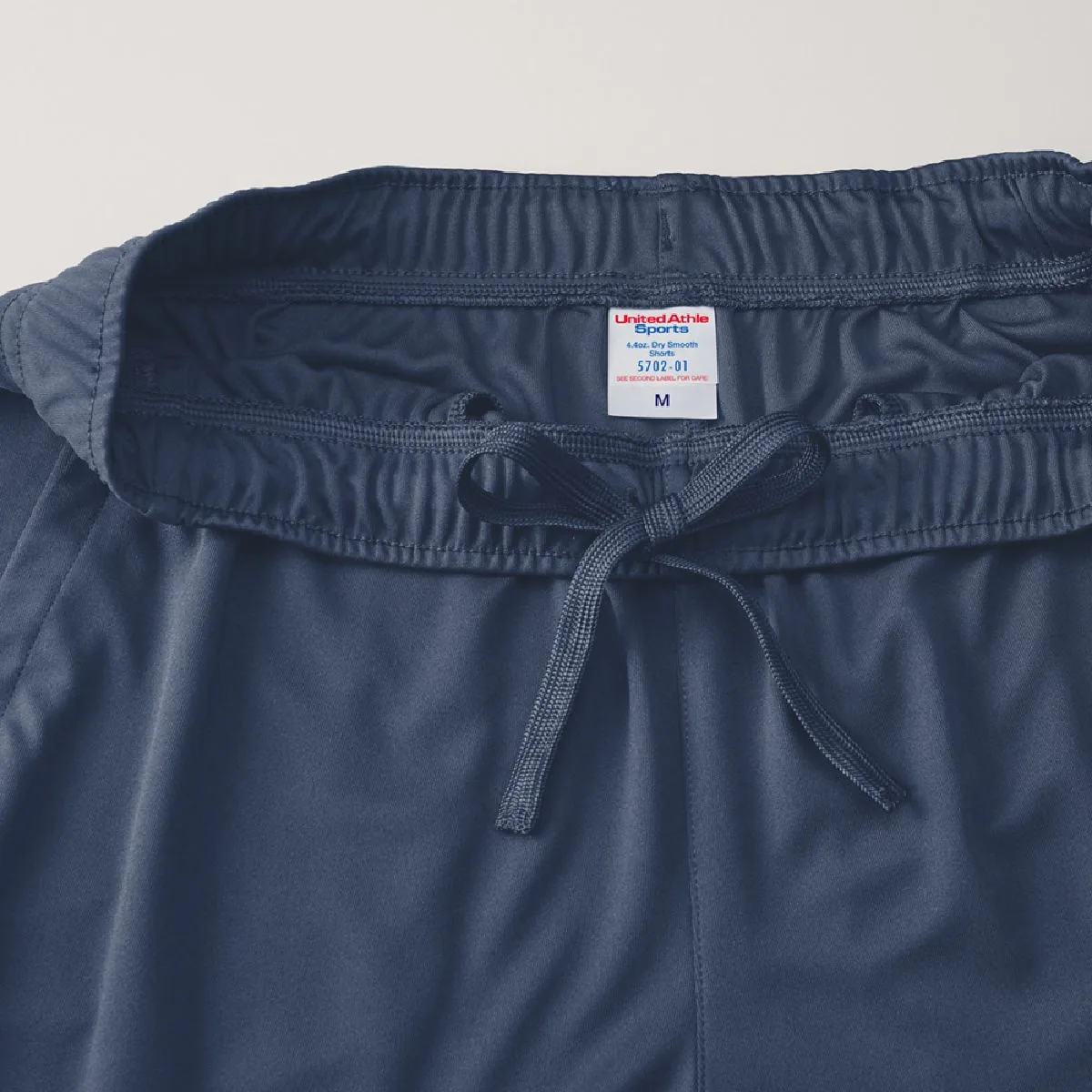 The waist has a flat string with adjustable body fabric color matching (inside)