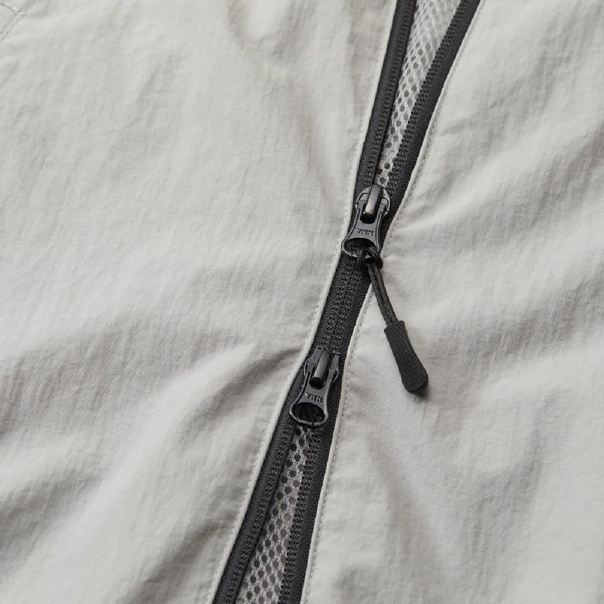 The color of the zipper tape is navy the same color, and the other colors are black