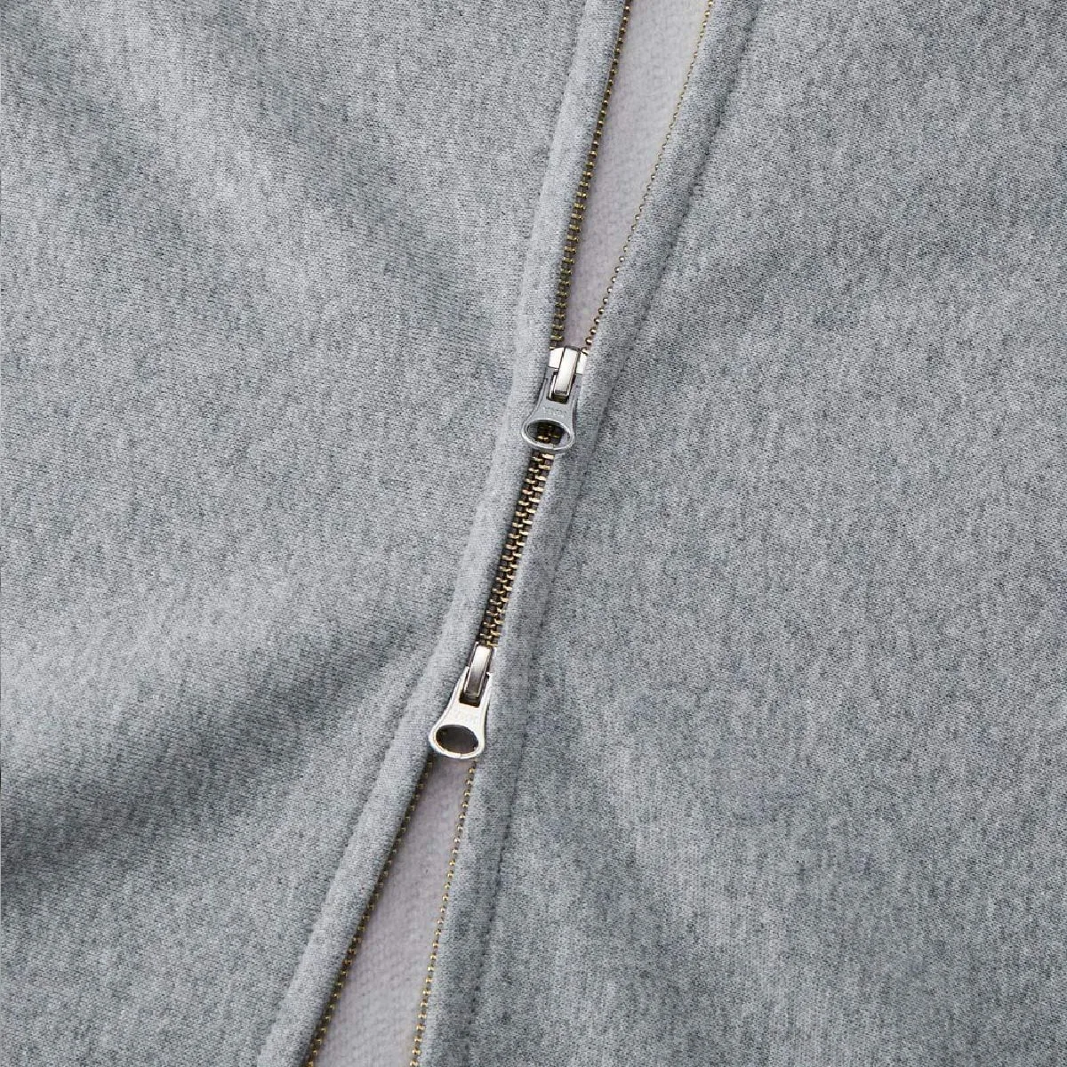 The zipper is hidden, the double slider specification made by YKK, the puller is the DALH type