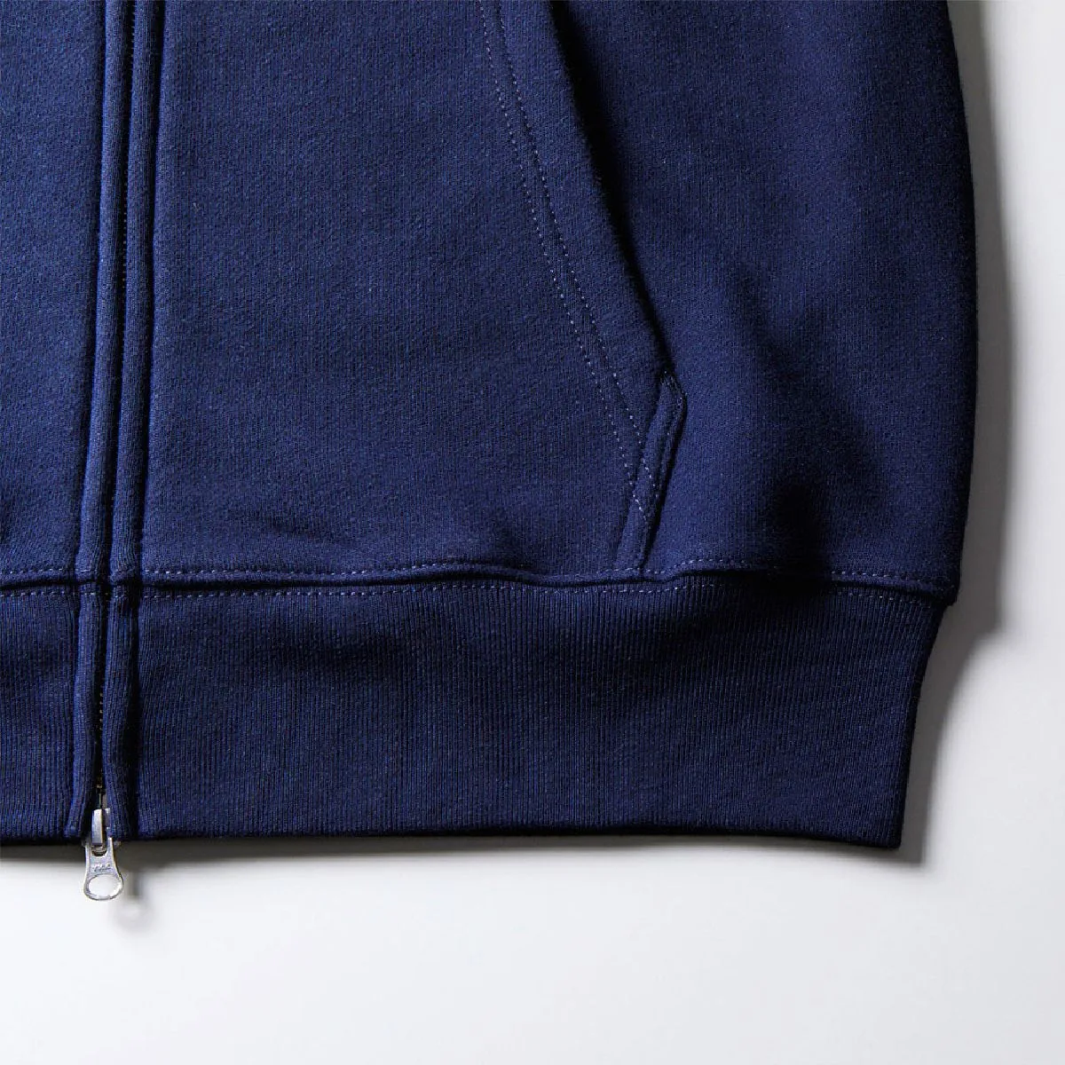 The ribs at the hem and the seam line of the body are durable double stitching