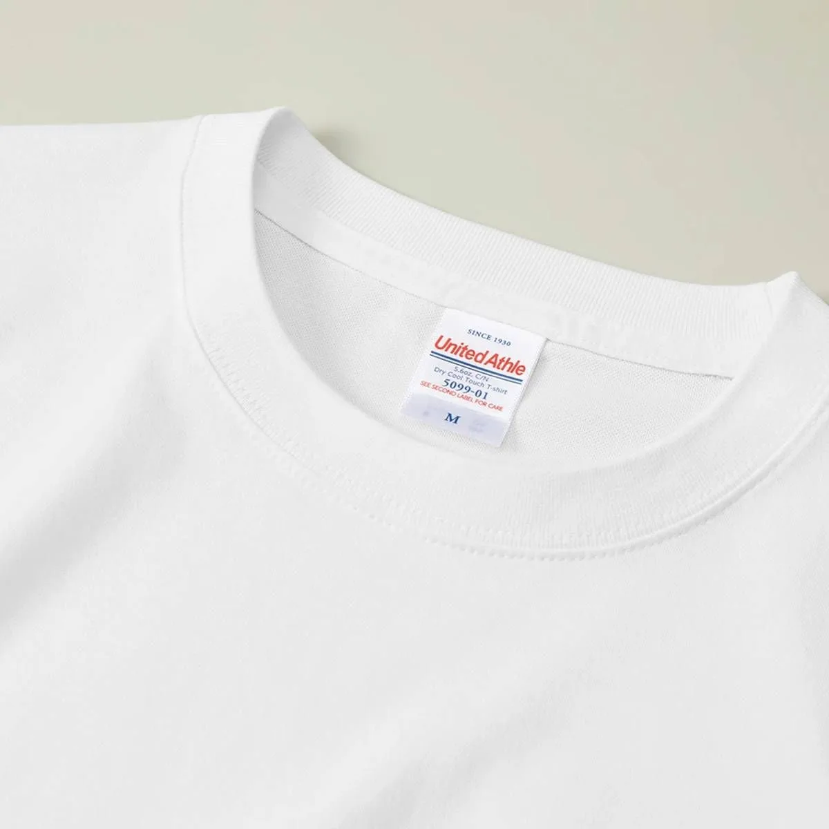 The neck ribbing is finished with durable double stitching.