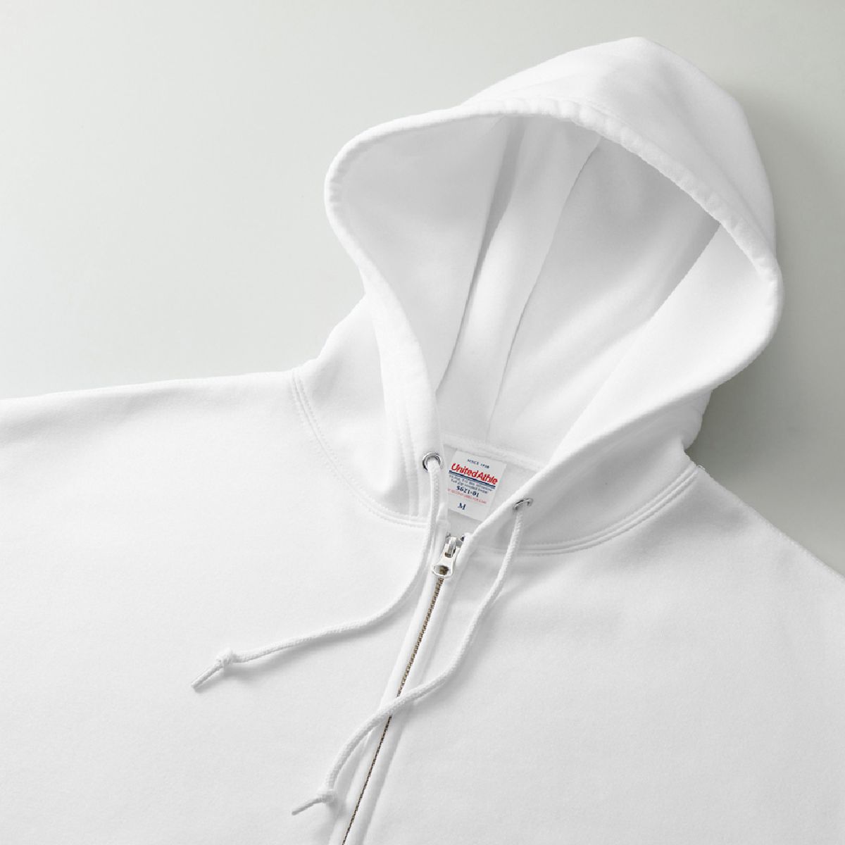 It features a distinctive, oversized double hood.