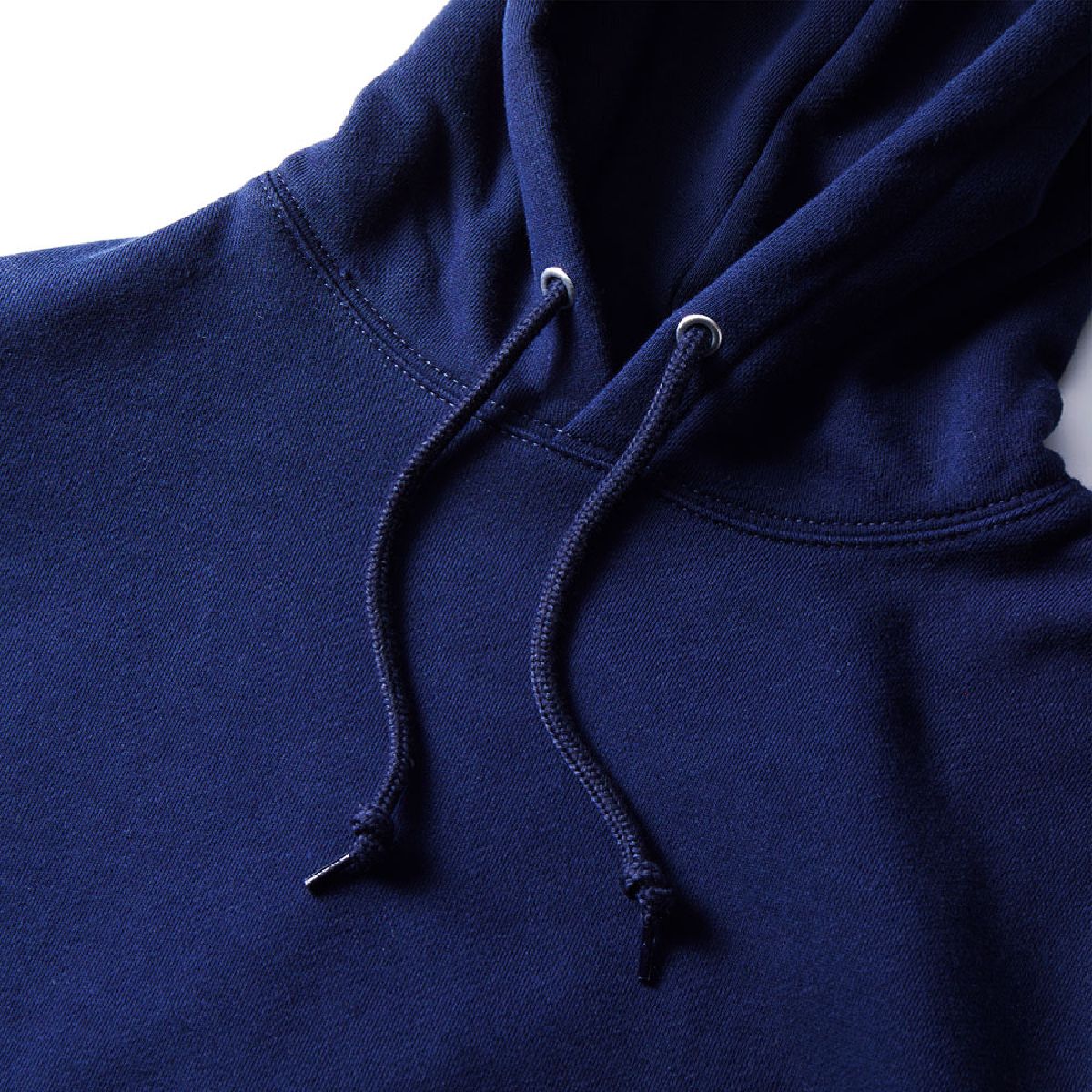 The hood drawstring is a round cord in the same color as the body of the garment.
