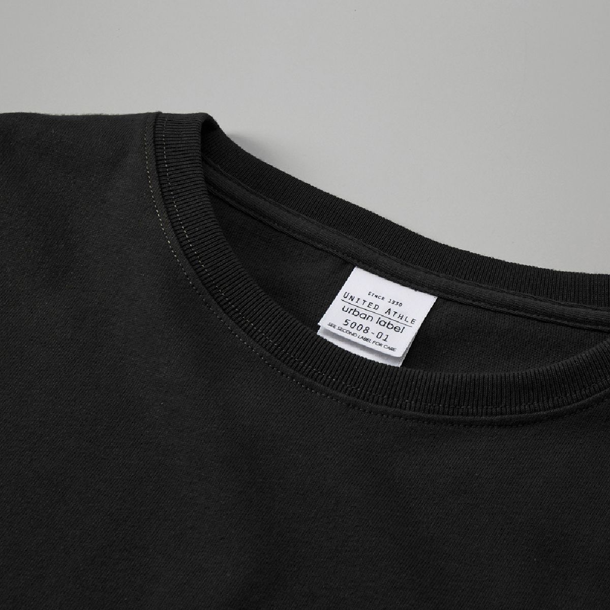 The neck ribbing is finished with durable double stitching.