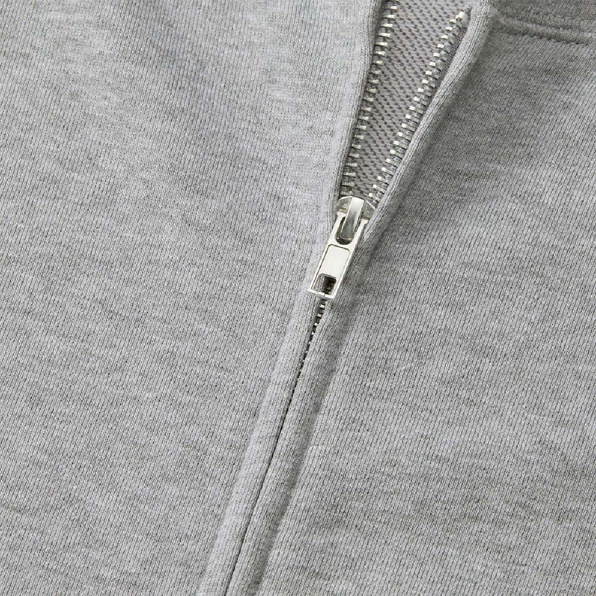 The zipper has a concealed teeth design and a single slider.