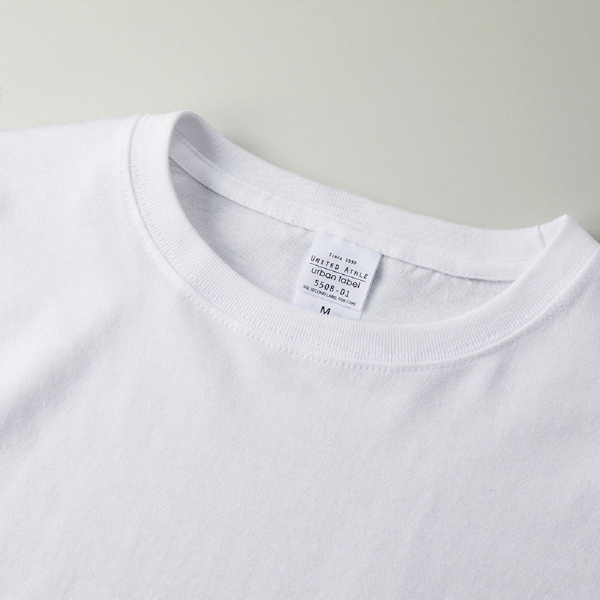 The neck ribbing is finished with durable double stitching.