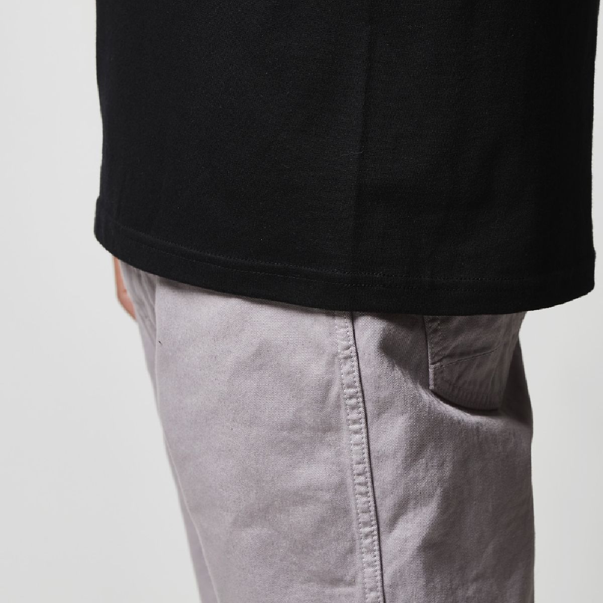 Seamless construction, double-needle stitching at the hem.