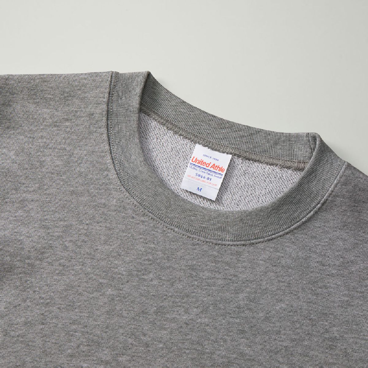 The neck ribbing is finished with durable double stitching.