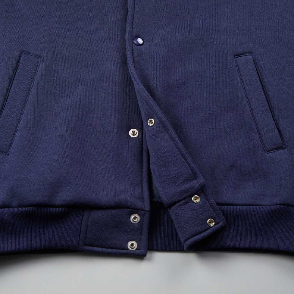 The front has snap buttons and is a metal American-style (Permex type).