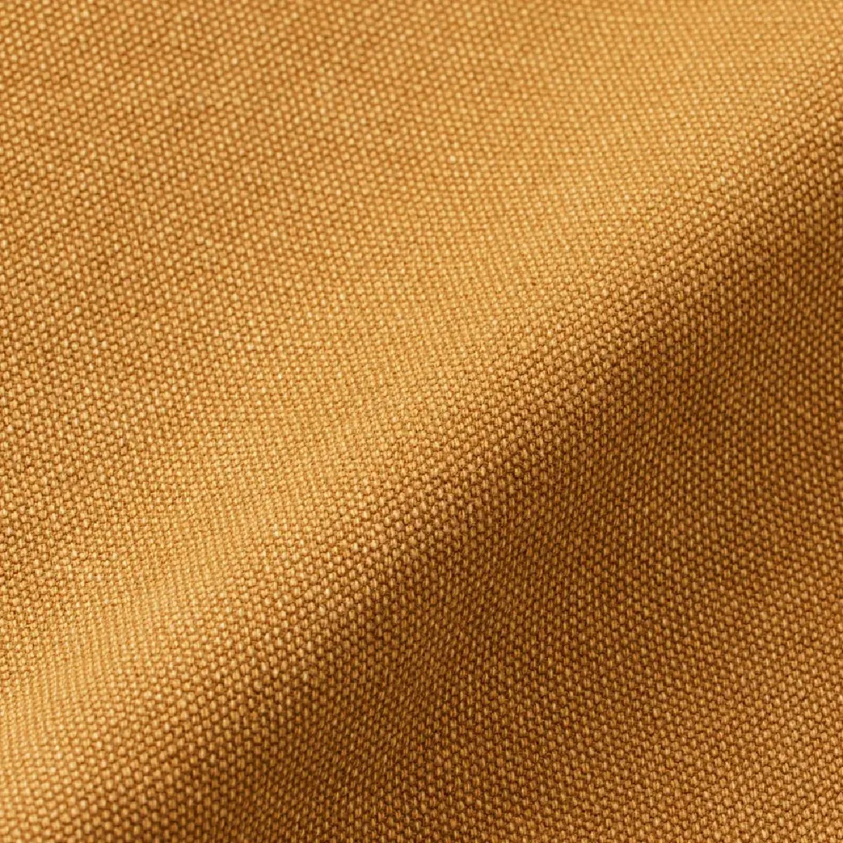 The duck canvas fabric, woven with thick threads at high density, is given a faded look and a moderately reduced stiffness through bio-stone processing, creating a texture that looks like it's been worn for many years.
